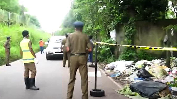Sri Lanka Police at a crime scene at Mabima in Sapugaskanda Sri Lanka