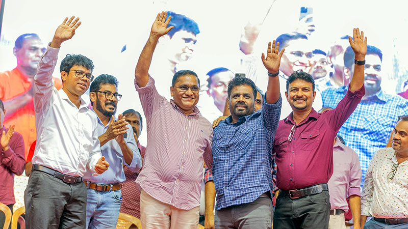 Anura Kumara Dissanayake, Vijitha Herath, and Mahinda Jayasinghe at an NPP political rally in Kiribathgoda, Sri Lanka