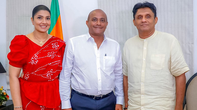 Hashan Tillakaratne and his wife, Apsari Tillakaratne, with Sajith Premadasa