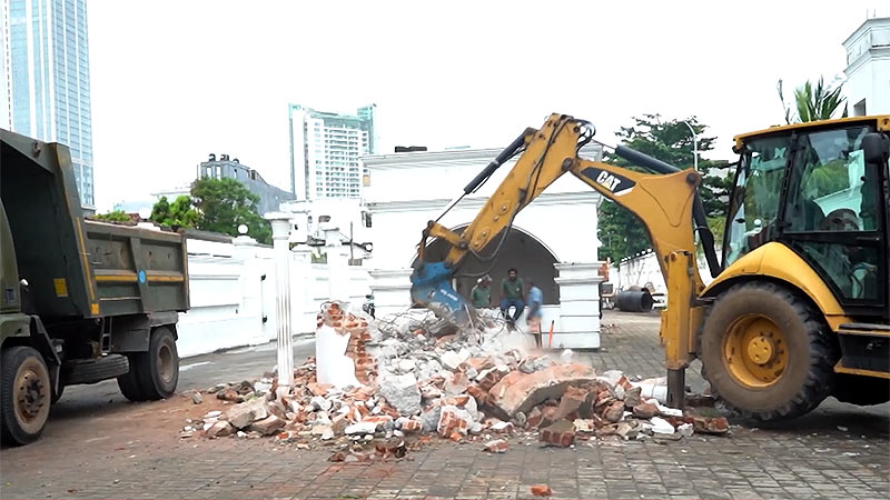 Security booths removed from either side of the road near Temple Trees in Colombo, Sri Lanka