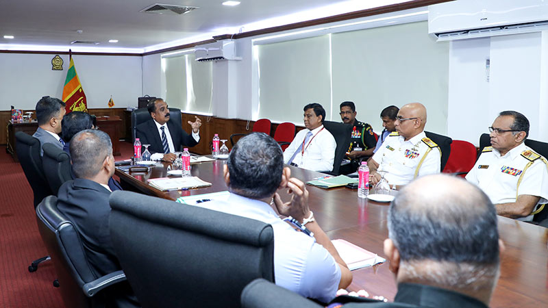 The Deputy Minister of Defence, Major General Aruna Jayasekara (Retd) is at a meeting