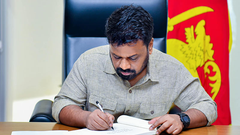 Sri Lankan President Anura Kumara Dissanayake is writing