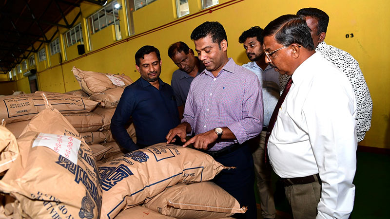 Health and Media Minister Dr. Nalinda Jayatissa inspecting operations at the Thriposha Company in Sri Lanka