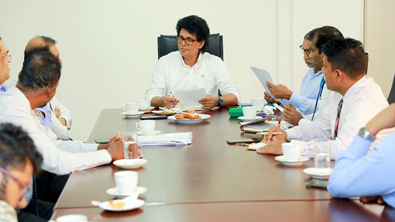 Trade Minister Wasantha Samarasinghe speaking at a meeting