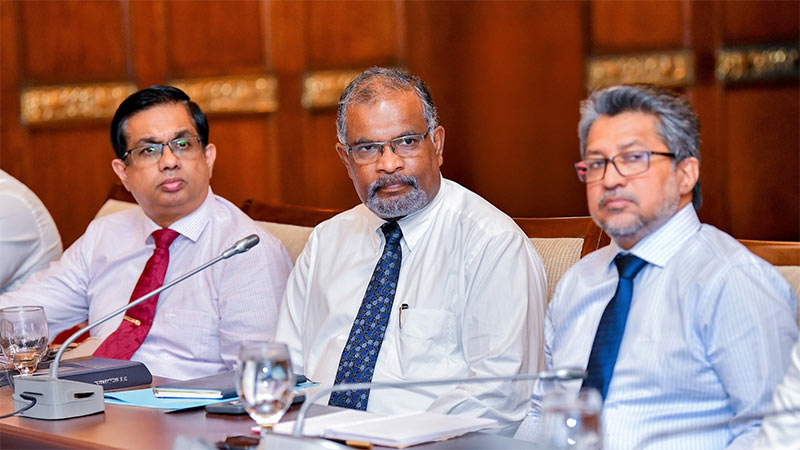 Dr. Nandika Sanath Kumanayake, Mahinda Siriwardana and Russel Aponsu